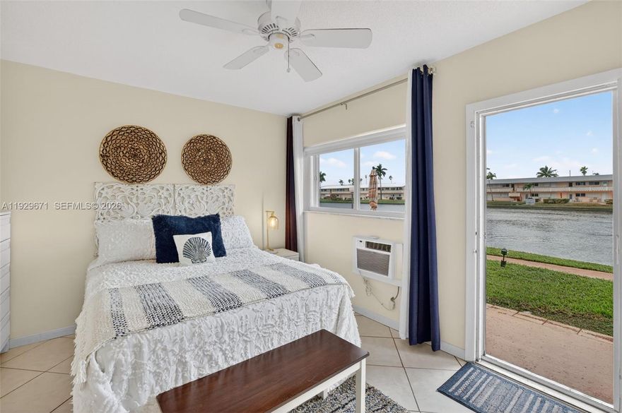 Beautifully remodeled unit with 1 bedroom, and 1 bathroom in a prime lakefront location within Rolen Lake. Ideally situated next to the clubhouse, this unit offers some of the best views in the community and is just steps from the pool. Light, bright, and inviting, the home features serene lake views directly from the bedroom and stunning waterfront scenery right outside the back door. The open-concept kitchen is designed for both function and entertaining, featuring abundant cabinetry extending to the ceiling, providing lots of storage, along with quartz countertops and a welcoming layout. The unit is fully furnished and tastefully decorated—truly turnkey and all-inclusive. Additional highlights include a stylish wood-accent wall in the living room, impact windows throughout, a full-size washer and dryer inside the unit, bedroom A/C plus mini-split in the living area. Located in a well-maintained, HOPA-verified community offering resort-style amenities such as a sparkling waterfront pool, BBQ area, shuffleboard, billiards, fitness center, and community room. Conveniently close to beaches, shopping, dining, and major highways. This is the perfect blend of comfort, convenience, and Florida living at its finest.