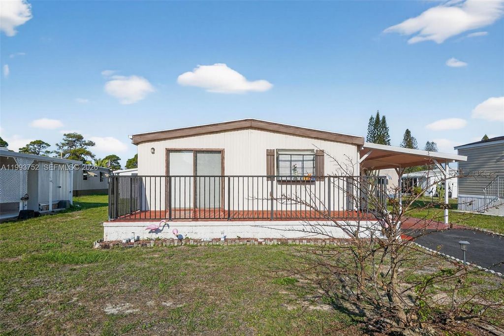 Photo of 415 E Erie Drive, Fort Pierce, FL 34946 (MLS # A11993752)