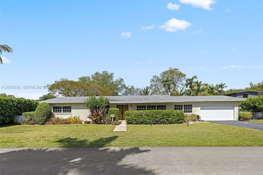 First time on the market in over 60 years, this North Palmetto Bay home is a rare opportunity, lovingly maintained by its original family. Thoughtfully designed ahead of its time, the home features a desirable open layout with a spacious kitchen flowing seamlessly into the family room, along with a formal dining area ideal for entertaining.  Glass sliding doors lead to a generous screened patio, creating an indoor-outdoor connection and overlooking a large, private yard framed by mature trees—often visited by cardinals and local birds. This property offers ample space to add a swimming pool, with room to park a boat along the side of the home.
The floor plan includes a spacious primary suite with a walk-in closet and decent-sized bathroom for the era, reflecting the home's forward-thinking design. While much of the original character remains, key updates have already been completed, including a 6-year-old roof and 5-year-old A/C. Ready for personalization or reimagination, this is an exceptional opportunity in a highly sought-after location—just a few homes from Pinecrest and within walking distance to Howard Drive Elementary, and close to Palmetto schools.