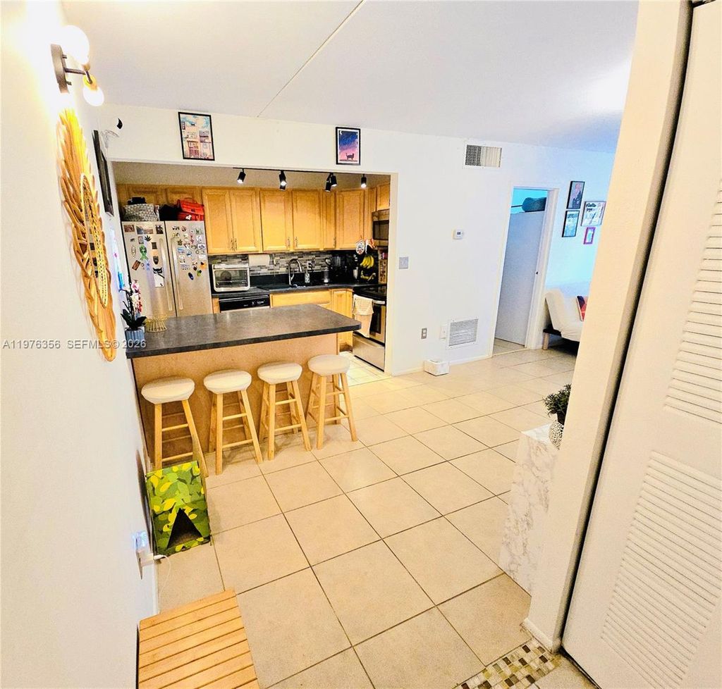 Photo of 5767 Washington St #F2, Hollywood, FL 33023 (MLS # A11976356)