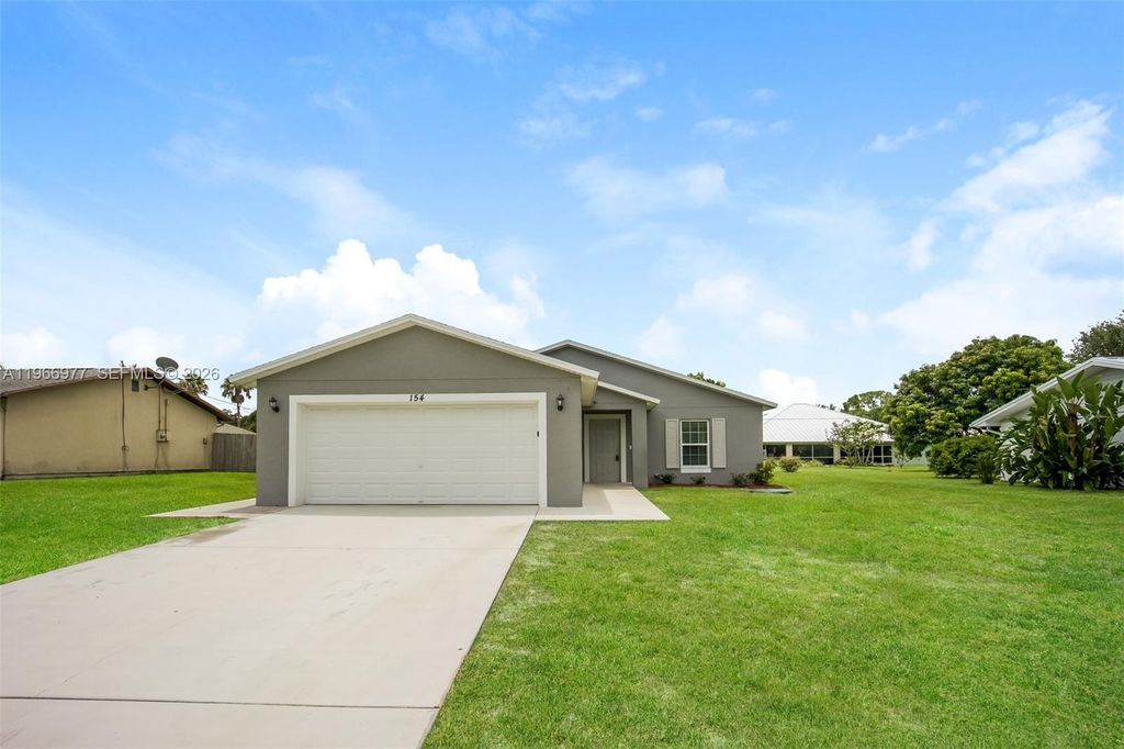 Photo of 154 NW Curtis St, Port St Lucie, FL 34983 (MLS # A11966977)