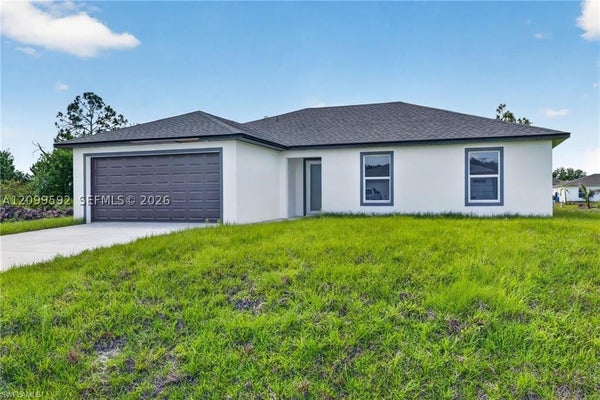 1054 CHADWICK AVE, LEHIGH ACRES, FL 33974 - Image e9aeafb77747e3a4e7d29471c577c37d/1275006552