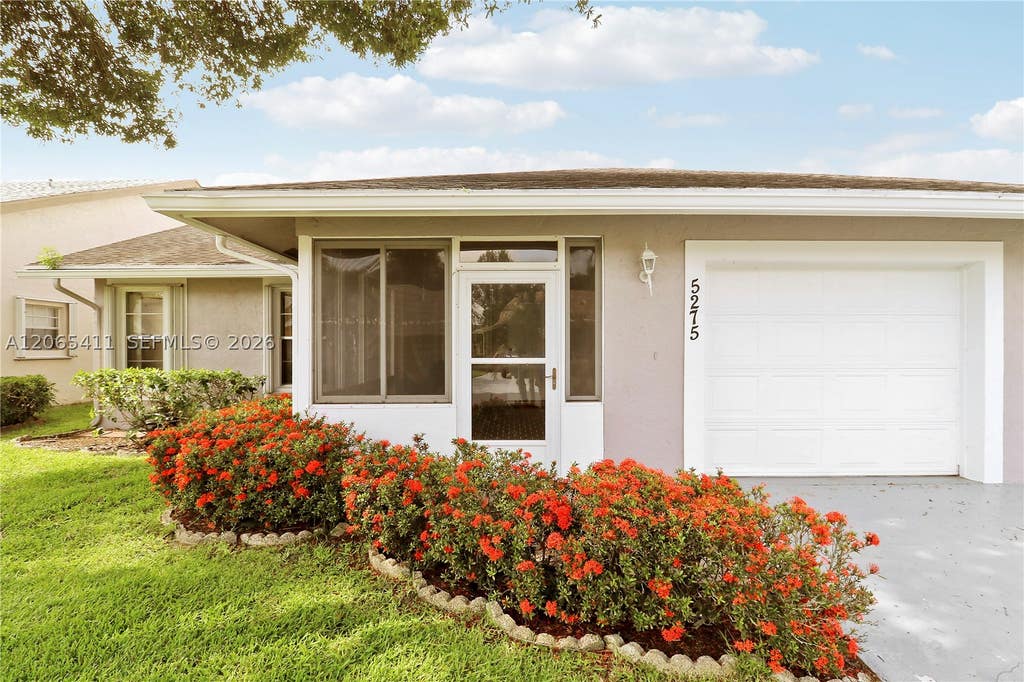 Photo of 5275 Tiffany Anne Cir, West Palm Beach, FL 33417 (MLS # A12065411)