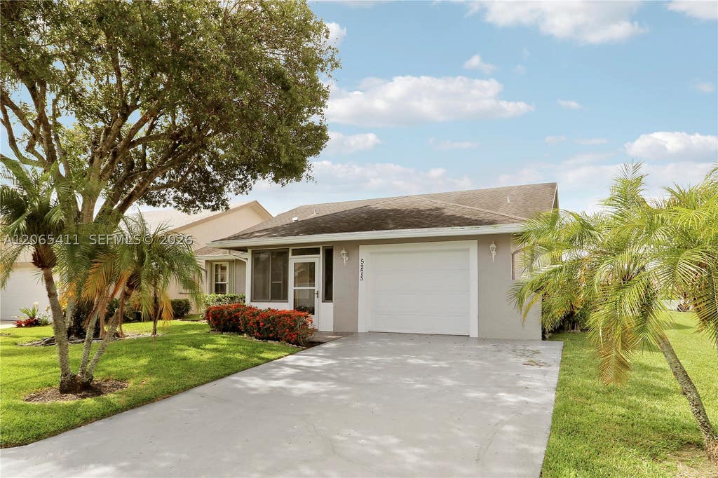 Photo of 5275 Tiffany Anne Cir, West Palm Beach, FL 33417 (MLS # A12065411)