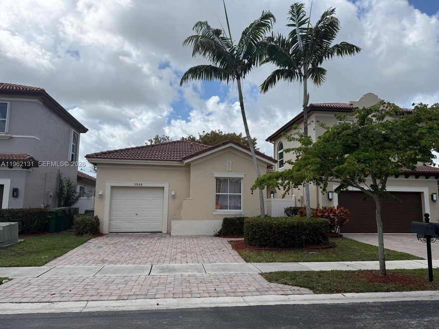 Beautiful 3 bedroom 2 bath split floor plan home with a 1 car garage.  Good condition tiled throughout. The house has been freshly painted completely in white, including baseboards and doors. Located on Portofino Palms is a gated community within the gated community of Waterstone! Club house with community pool and gym! HOA Approval will take at least 3 to 4 weeks for approval, please plan accordingly! Easy to show