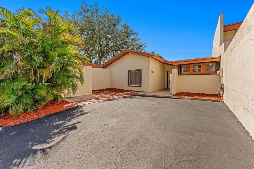 Beautifully remodeled one-story 3-bedroom, 2-bath corner villa in the desirable KendallTown community. Features open-concept living with vaulted ceilings, tile floors throughout, and no popcorn ceilings. Includes a spacious additional room ideal for an office or playroom, brand new A/C, and tankless water heater. The kitchen offers wood cabinets, granite counters, and new stainless steel appliances. Bathrooms are fully updated with modern vanities. Accordion shutters throughout. Enjoy a private screened patio, fenced backyard, detached storage shed, and 2-car driveway. Community amenities include a clubhouse, heated Olympic pool, jacuzzi, kids pool, playground, tennis, pickleball, racquetball, 24-hour security, and proximity to shops, highways, and top schools.