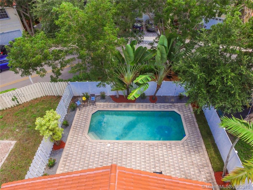 Superb remodeled 4 BR, 2 Bath pool single family home in gated Emerald Isles of Weston. Not huge square foot-wise but feels much bigger via super design, layout. Double sets of sliding glass doors open to tropical paradise, fully fenced yard, no neighbors behind, your own private pool. Just competed remodeling the master suite-new new wood-look tile plank flooring, fully remodeled master bath. Kitchen was already remodeled/upgraded with wood cabinetry and granite countertops. Walk to community pool, top Weston schools, Tequesta Park. Roof, A/C both less than 2 years old. Newer kitchen appliances, washer, dryer and hot water heater. Unique opportunity at this price range. Close to Weston Town Center, parks, hospital, houses of worship and I-75 for easy commutes in every direction