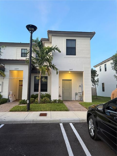 Photo of 12877 SW 232nd Ln, Homestead, FL 33032 (MLS # A11913286)