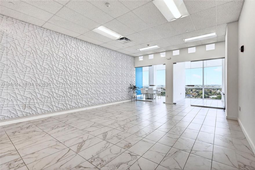 Move-in ready Class A office located on the 9th floor of the prestigious Beacon Tower in Aventura. This 1,034 sq. ft. professional office space features a functional layout with two private office divisions and offers panoramic city views from an elevated floor. The unit is ideal for owner-users or investors seeking a professional workspace in one of South Florida’s most dynamic business districts.

Beacon Tower offers premium amenities including a sky lounge, Terrace Park, wet bar, meeting lounge, and landscaped outdoor meeting areas, creating a modern and collaborative business environment.

Strategically located in the heart of Aventura’s commercial corridor and immediately adjacent to the Brightline station, providing convenient access for clients, employees, and business partners. The building combines modern design, strong visibility, and accessibility with low monthly maintenance, making it an attractive option for professional firms, consultants, legal, financial, or medical-related services.