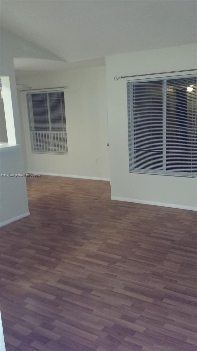 Amazing spacious 1 bedroom 1 bath unit with vaulted ceilings. Community is generously landscaped and is certified as a wildlife habitat. Investor friendly! Washer and dryer inside, open kitchen with pantry, dining room area. Relax or entertain in a spacious balcony. Gated with two entrances. Super convenient location close to I 95 and half way between West Palm and Miami.