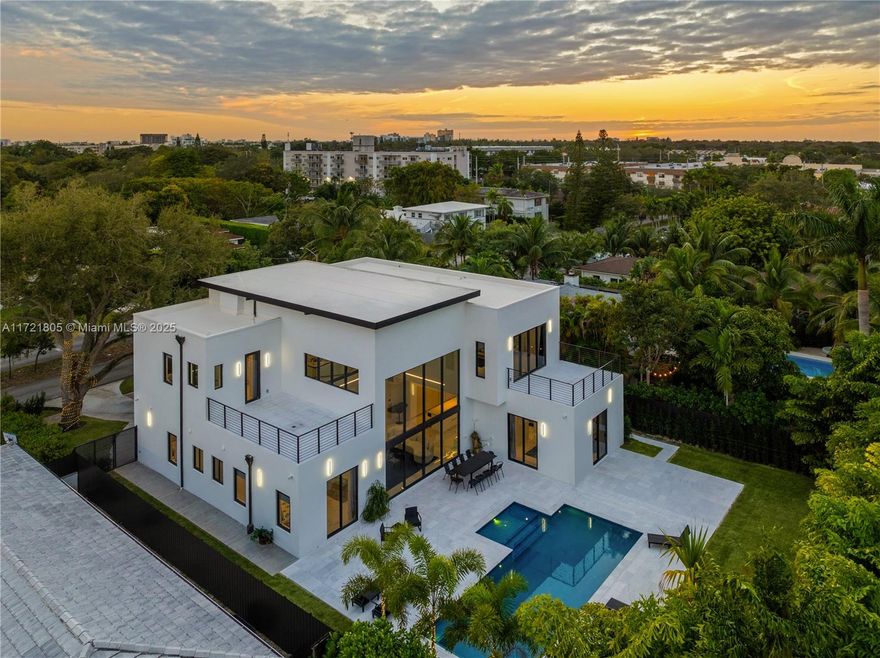 Brand new construction modern estate in Shorecrest! This 2-story home features 5 spacious bedrooms, 5.5 luxurious bathrooms, and a dedicated study. The soaring 25-foot ceilings and open-concept design create a light-filled, airy atmosphere, enhanced by sleek floor-to-ceiling windows. Highlights include a floating family room, smart home automation, and a gourmet kitchen with top-of-the-line appliances and custom cabinetry. The heated pool is surrounded by a marble terrace, perfect for outdoor entertaining, along with two elevated terraces overlooking the lush landscaping. Additional features include epoxy floors, a 3-car garage, and seamless indoor-outdoor living.
