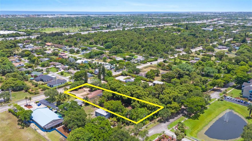 Rare 31,378 sqft lot in unincorporated PB County with NO HOA offers exceptional flexibility and potential! Zoned SF Res with Future Land Use designation of LR-2 (Low Resi 2 units/acre), this property presents a variety of options for homeowners, investors, and developers alike. The existing 3/2 home offers a solid foundation for a complete remodel; even has original terrazzo floors! Plenty of space to add a guesthouse, workshop, or additional structure to suit your lifestyle or income-producing goals. With possible subdivision potential—thanks to street access both in front and behind the property—this lot is a rare find in a central location. Additionally, a Boynton Beach annexation feasibility study is currently underway,offering future upside in city connectivity and municipal services.