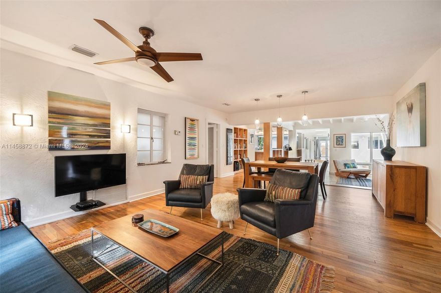 Experience the allure of Coconut Grove! Nestled among tree-lined streets of South Coconut Grove, this 4-bedroom, 3-bathroom residence offers over 2,400 sq ft of open living space flooded with natural light. With high ceilings and abundant windows, this home exudes a unique charm.

Tucked away amidst the lush foliage of the Grove, this home is a hidden gem. It effortlessly blends modern updates with timeless charm, evoking the essence of living among the beloved Grove canopy.

Step outside to discover a spacious heated pool and an inviting outdoor patio, perfect for hosting guests and enjoying leisurely barbecues. Don't miss the opportunity to witness this enchanting property firsthand!