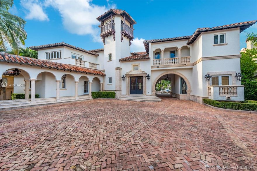 This Islands of Cocoplum signature home truly represents the Coral Gables resort lifestyle & a boater's paradise: boasting one of the largest docks on the Island's Waterway & minutes from the open ocean. This magnificent 7 bed 6.5 bath with over 7,500 sf is situated on a 22,725 waterfront lot without any bridges to bay, deep water wide canal & over 100+ft  water frontage. Separate office & library w/ water views, 4 car garage, detached cottage, cabana bath & sauna, practice tennis & basketball court & a private beach to enjoy all your water toys. Ride your golf cart within this gated & secure community to the private marina, tennis courts, full basketball court, playground & gym. Located in the most desired area of Coral Gables, just steps away from Coconut Grove & South Miami.