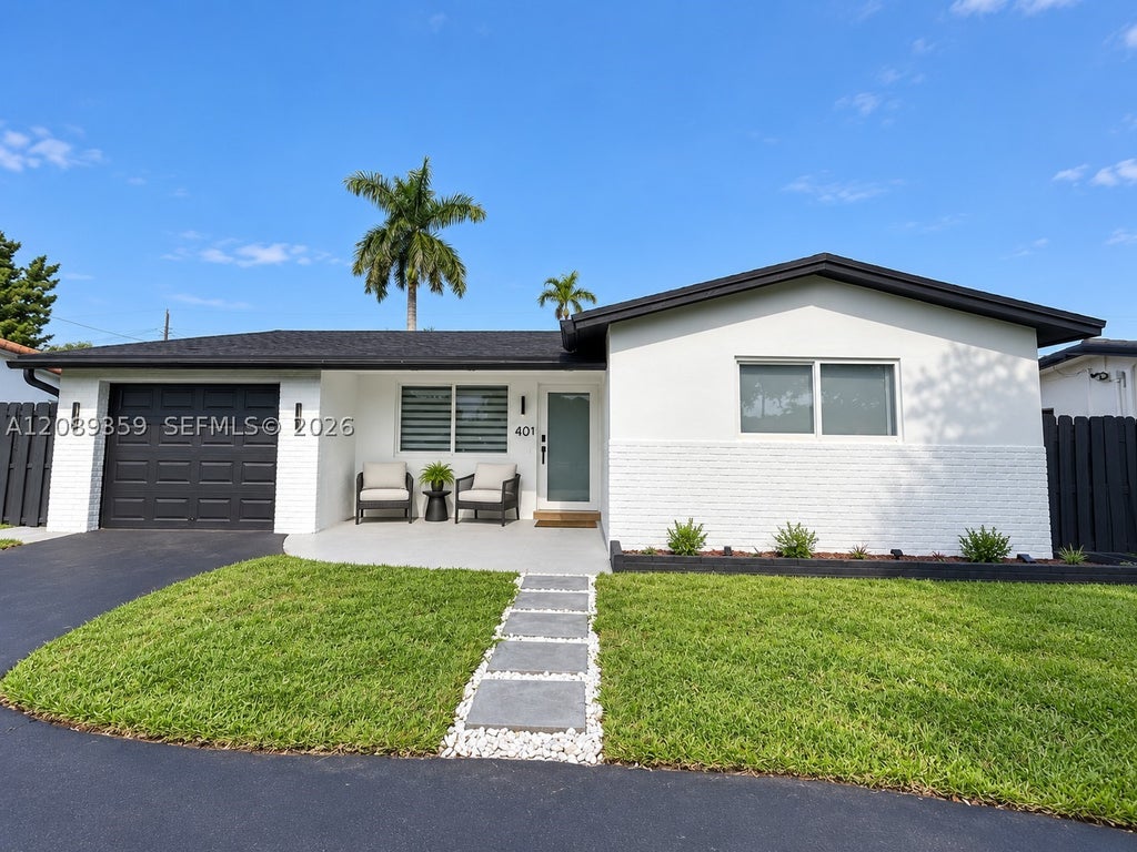 Photo of 401 S Highland Dr, Hollywood, FL 33021 (MLS # A12089359)