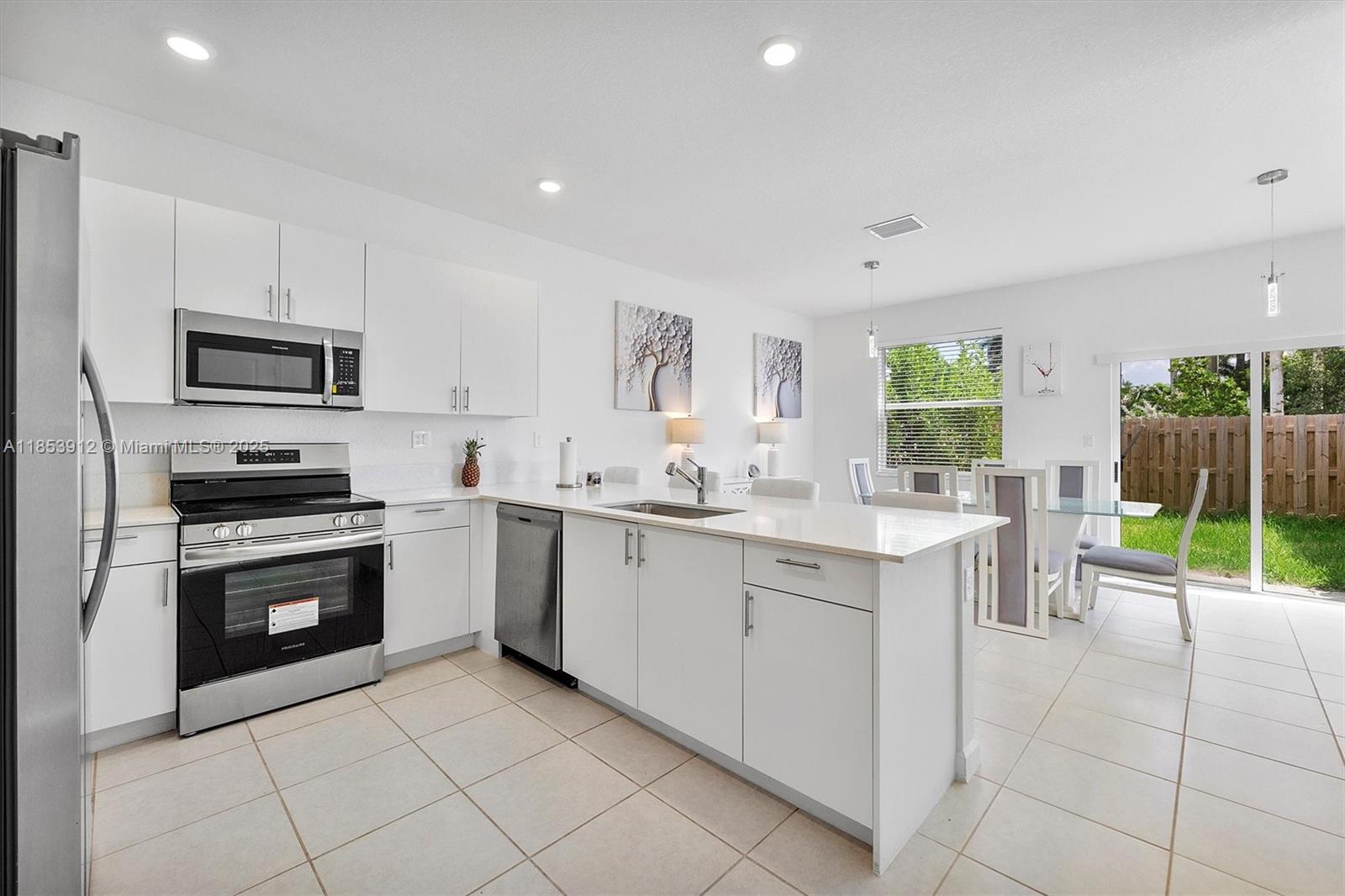 LARGEST BRAND NEW CORNER TOWNHOME in Cedar Pointe! Features 3 bedrooms and 2.5 bathrooms, quartz kitchen countertop, stainless steel appliances, full-size washer and dryer, impact windows with newly installed blinds in every room, tile first floor, carpeted second floor, Ring technology, and keyless entry. Enjoy the spacious open concept kitchen with abundant natural light and a charming fenced backyard without a direct neighbor behind it. You'll find convenience with 2 parking spots directly in front of house and plenty of guest parking. Internet is included in rent. Amenities include a club house and swimming pool - coming soon. Close to shops, schools, 5 minutes from Turnpike, and 35 minutes from the Miami International Airport.