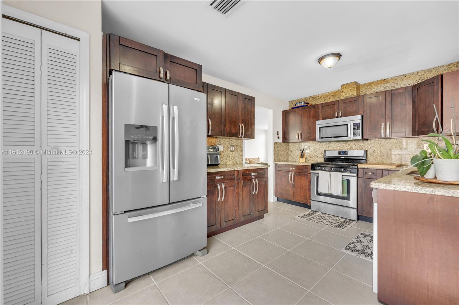 POINCIANA AT SUNSET LAKES - Residential