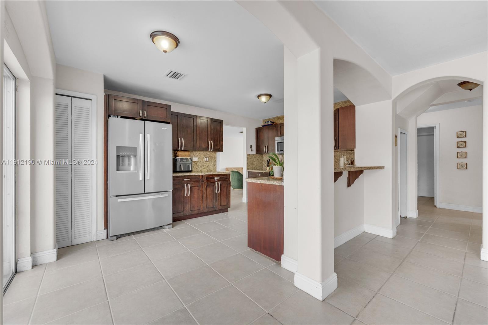 POINCIANA AT SUNSET LAKES - Residential