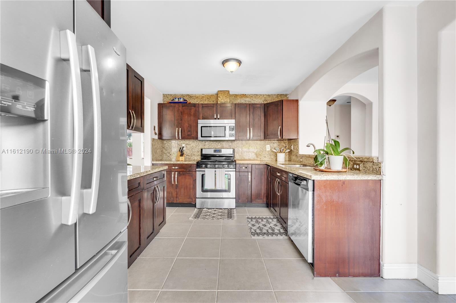 POINCIANA AT SUNSET LAKES - Residential