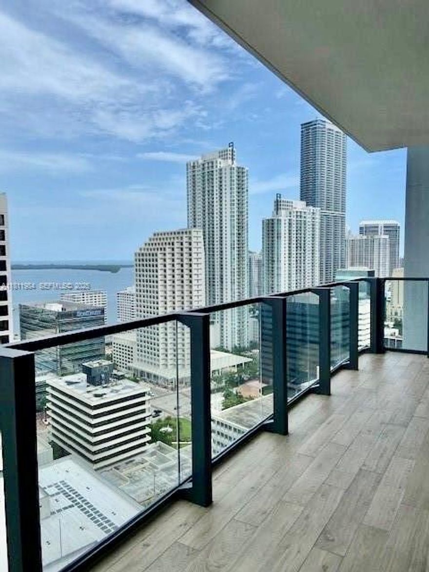 Luxury living in this upgraded 2-bed + den, 2/5 bath residence at Reach, located in the heart of Brickell City Centre. Private terrace with breathtaking water & city views, ideal for entertaining or relaxing in style.Top-of-the-line interior features a modern Italian kitchen with enlarged cabinetry, premium Bosch and Miele appliances, quartz countertops, and a wine cooler. Marble floor, floor-to-ceiling windows.
5-star amenities, 2 pools, jacuzzi, full-service spa, sauna, steam room, fitness center, outdoor training areas, children's playroom, kids club, business center, library, social/party room, BBQ, tropical gardens, 24-hour concierge, security, private café, and direct VIP access to high-end shopping and dining at Brickell City Centre (Saks Fifth Avenue, Apple, Casa Tua Cucina & more