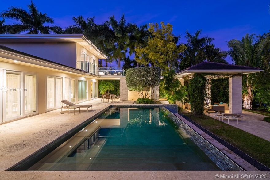 Inspired by the beauty of Casa de Campo, one of Cocoplum's loveliest homes has just become available. Located on a private cul-de-sac in this Coral Gables gated community "Villa Serena's" design is luxurious yet intimate, blends interior & exterior entertainment spaces, includes wide galleries for art collecting & is replete with a beautiful gourmet indoor kitchen, outdoor summer kitchen, stunning terraces, an infinity pool, as well as 112' feet of water frontage & a 69' private dock. The Children's wing is comprised of three large en suite bedrooms & a bonus fam room, while upstairs is a private Master suite, gym & balcony. The family room spans the back length of the home & overlooks the pool. Only minutes to Biscayne Bay by boat, this exceptional estate embraces South FL coastal living.