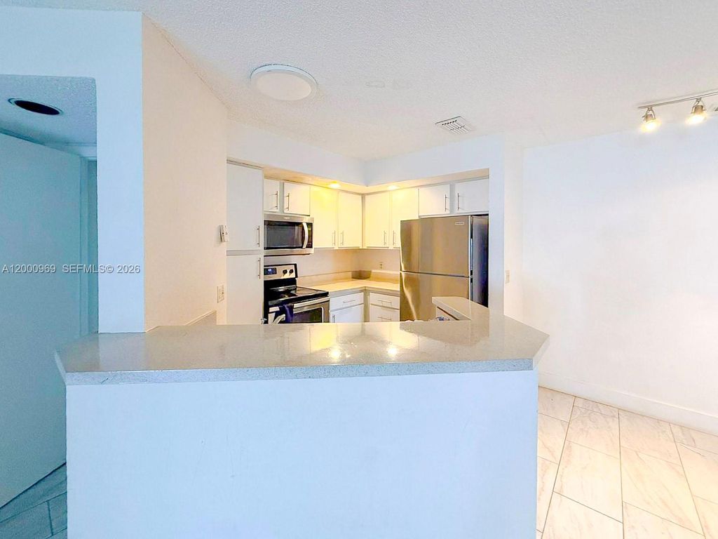 Photo of 3440 N Pinewalk Dr N #518, Margate, FL 33063 (MLS # A12000969)