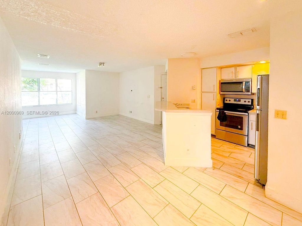 Photo of 3440 N Pinewalk Dr N #518, Margate, FL 33063 (MLS # A12000969)