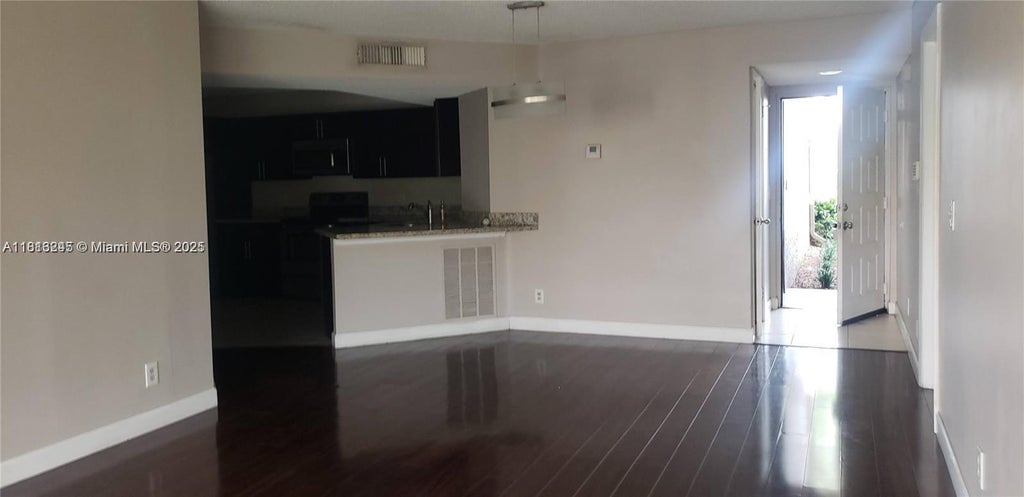Photo of 8977 Wiles Rd #108, Coral Springs, FL 33067 (MLS # A11813245)