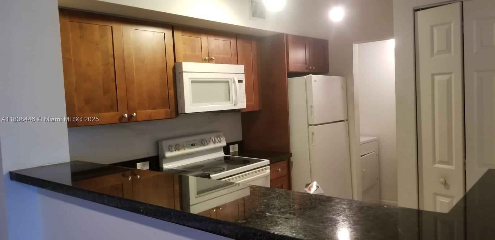 Beautiful 2BR/2BA Condo in Devonaire – Prime Pembroke Pines Location!
Welcome to this charming 2-bedroom, 2-bathroom condo located on the first floor in the sought-after Devonaire community, right in the heart of Pembroke Pines. This well-maintained unit features stylish laminate flooring throughout, a spacious open layout, and large bedrooms with walk-in closets for ample storage. Enjoy the convenience of an in-unit washer and dryer, and unwind on your private balcony with tranquil garden views.
Community amenities include a refreshing pool and kids’ playground—perfect for families. Unbeatable location just steps from Pembroke Lakes Mall, fine dining, shopping centers, hospitals, and major highways. Zoned for excellent schools and close to public transportation.