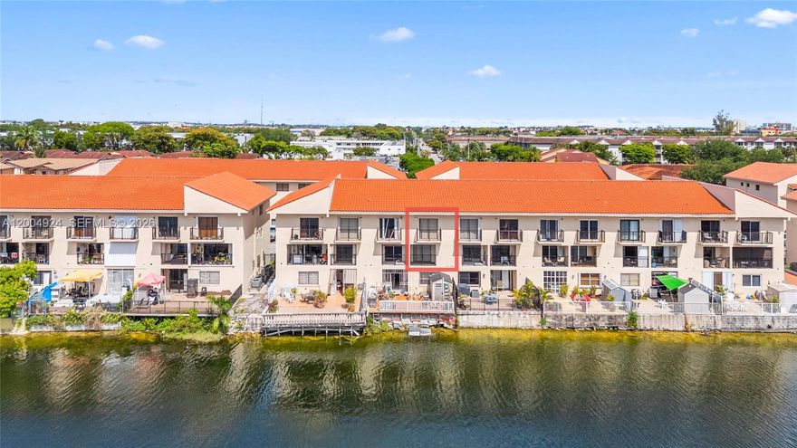 Large & Bright 2BR/1.5BA two-level residence with incredible wide, unobstructed lake views.  Features tile floors, freshly painted interior, smooth ceilings, and a spacious layout. Primary suite offers vaulted ceilings for an airy feel, plus full-size laundry for convenience. Located in one of the best-maintained communities with newly painted exterior, new roof, and ample parking. Safe, central location close to shopping, dining, and major highways, Well located in one of Hialeah’s most consistently high occupancy rental markets. Ideal for investors seeking stable cash flow and long-term appreciation.