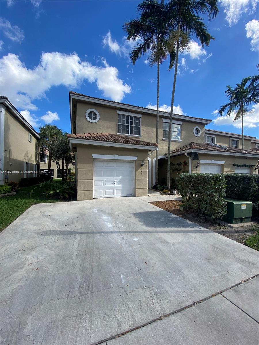 You will fall in love with this beautifully remodelled corner unit townhouse in the gated community of Pelican Pointe! Neutral color tiles in living areas, oak wood floors upstairs! Fully remodeled full bathrooms with quartz vanities, porcelain tiles, and custom glass shower doors! New impact front door! Home sits in the heart of Pembroke Pines! One-car garage! Water heater replaced in 2021! Patio and more.