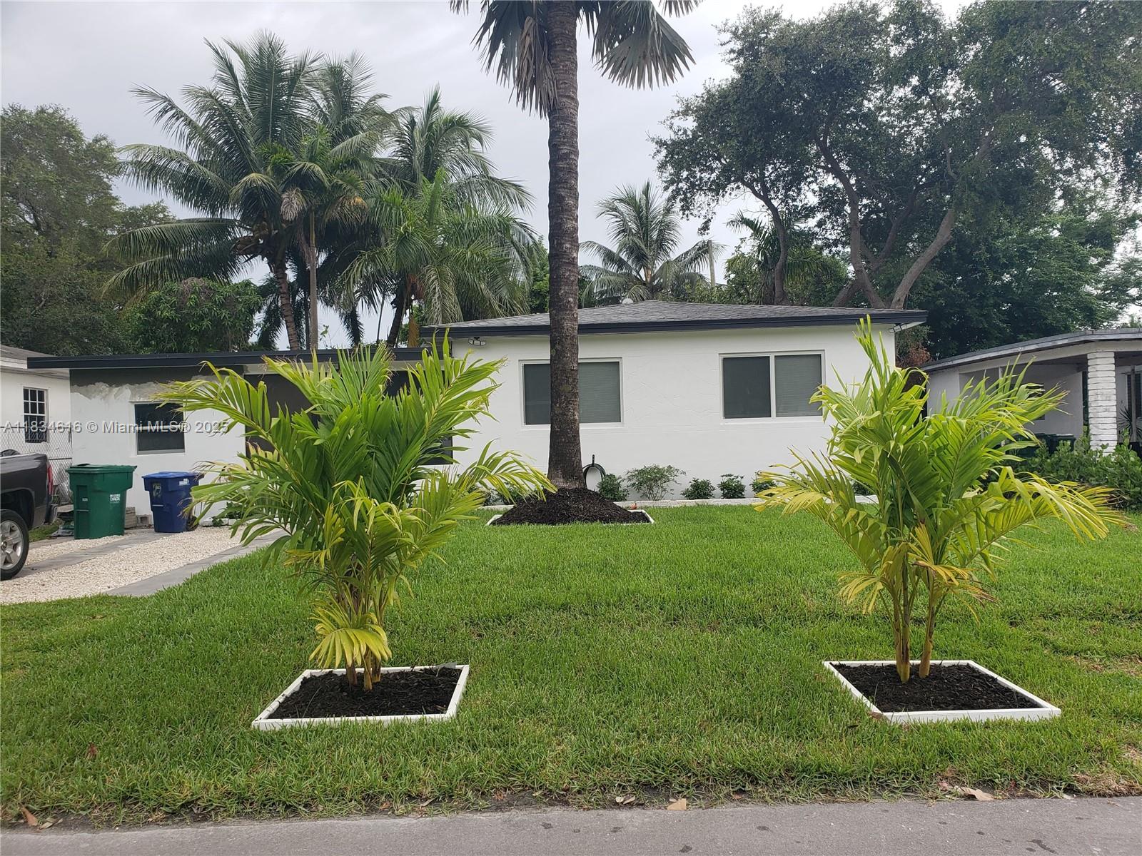 MOTIVATED SELLER! Beautifully renovated 3/2, with a detached 1/1 studio apartment with its own private entrance. Spacious backyard with mango trees and enough room to add a pool. Located just minutes away from beaches, major expressways, shops, restaurants, and Publix. This property is a MUST SEE and will go fast, so HURRY!