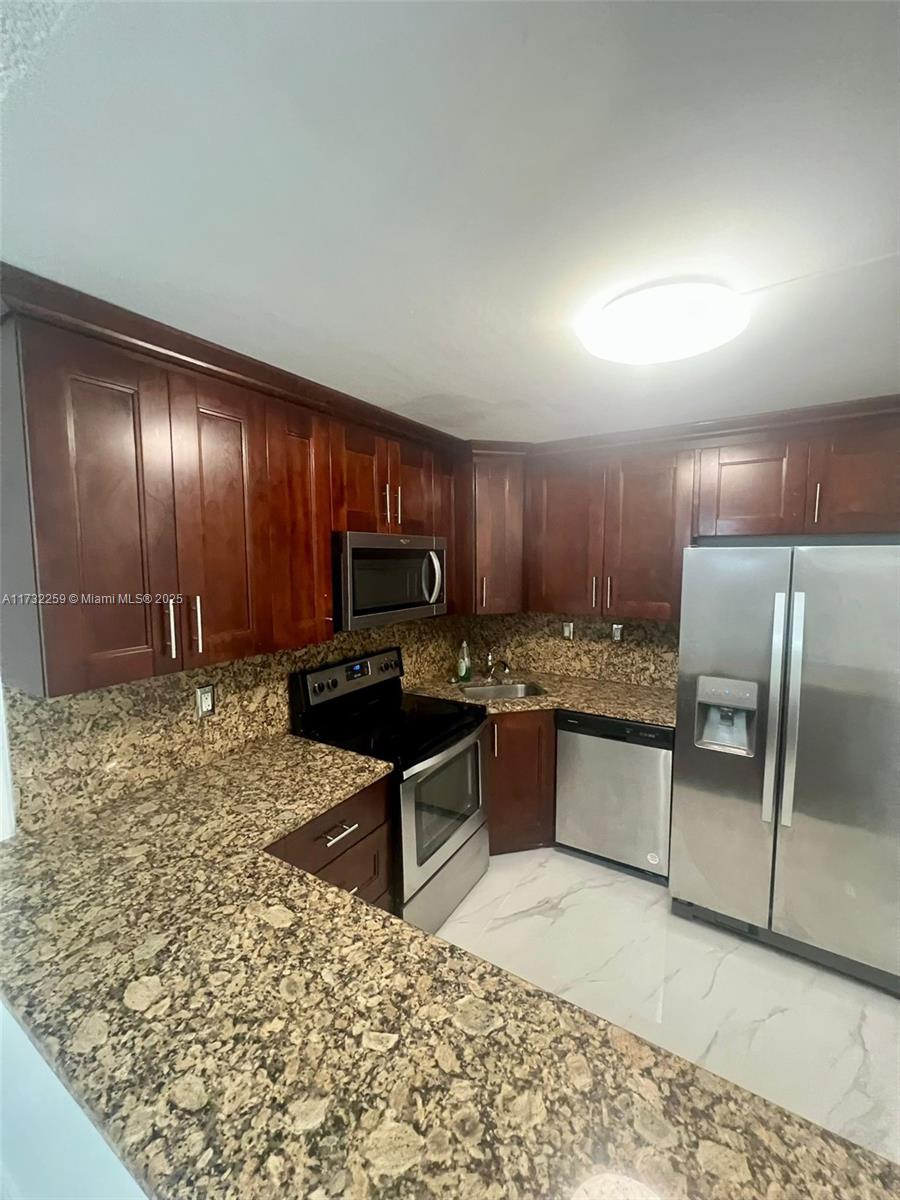 Beautifully updated 1-bedroom, 1.5-bathroom (extra room) unit in a quiet and desirable area of Boca Raton. This home features fresh paint, brand-new ceramic floors, and includes the convenience of 2 dedicated parking spaces. Enjoy a peaceful setting while being close to all that Boca Raton has to offer