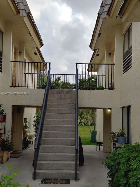 Photo of 11128 Royal Palm Blvd #8-10, Coral Springs, FL 33065 (MLS # A11960059)