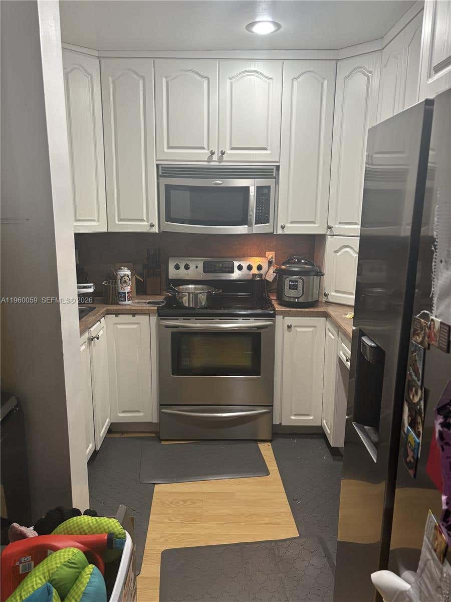 Photo of 11128 Royal Palm Blvd #8-10, Coral Springs, FL 33065 (MLS # A11960059)