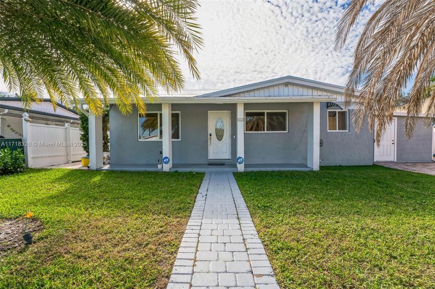 GORGEOUS rancher with 3 Bedrooms and 2 Bathrooms with additional bedroom, bath, and private entrance. Bright open layout with tile floors throughout. Cozy fireplace in the Living Room/Dining Room combo. The remodeled Kitchen features granite-slab countertops with decorative tile backsplash and stainless-steel appliances. Primary Bed with en suite. Relax under the shade of the palm trees while you lounge in the in-ground pool! Patio paver driveway with carport for convenience!