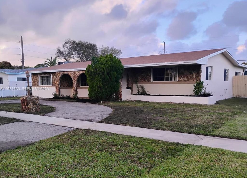 Photo of 5501 Madison St, Hollywood, FL 33021 (MLS # A11975386)