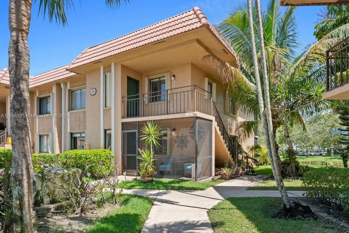 Looks like a model Home!!!!
Impeccable first floor corner unit with water front.
Completely renovated, modern open kitchen with large pantry, quartz counter tops, new stainless steel appliances, beautiful vinyl laminated floors through out. California walk in closet in master bedroom. Renovated bathrooms, no popcorn ceilings, new doors, front and rear patios. Enjoy the beautiful water views from your backyard. Great schools. New roof (2018) Community pool is steps away. Access to Bonaventure Town Center club with lots of amenities. HOA includes water, roof and building exterior.