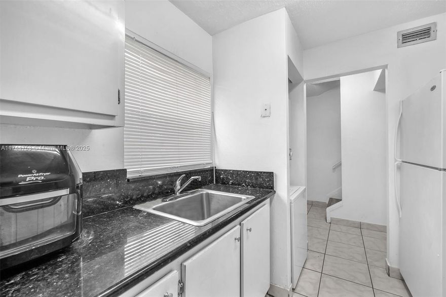 Great location and convenience for proximity to schools, parks, shopping, restaurants, or public transportation. Huge 2-bedroom 2-bathroom Townhouse with some moderations made to add shower and an additional bedroom downstairs. 2 upstairs bedrooms that can fit king size furniture, laminate flooring upstairs and ceramic tile downstairs, washer dryer in kitchen make this house a great layout for the whole family. Additional bedroom for elderly and/or students that want privacy. Endless possibilities for buyer to customize the space and get instant equity.  This home can be your and is a great value. A must see! Call or email to set an appointment today!