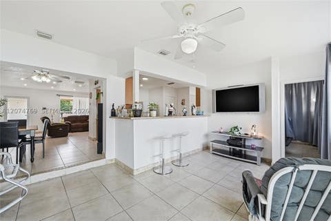 Tiny photo for 8641 NW 25th Ct, Sunrise, FL 33322 (MLS # A12074769)