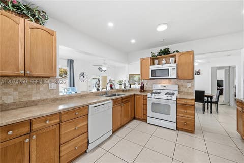 Tiny photo for 8641 NW 25th Ct, Sunrise, FL 33322 (MLS # A12074769)