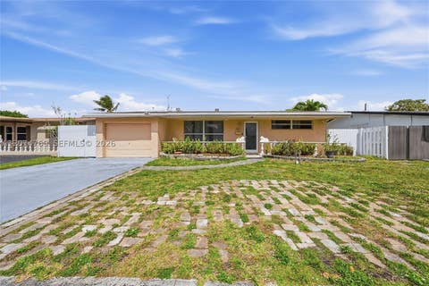 Photo of 8641 NW 25th Ct, Sunrise, FL 33322 (MLS # A12074769)