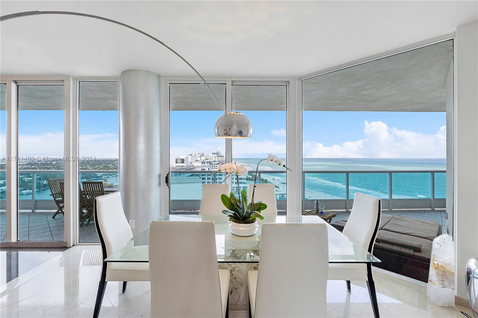 Experience the epitome of Miami living with breathtaking sunset and sunrise views! This luxurious boutique building boasts only two residences per floor, offering panoramic ocean and intracoastal views. The remodeled kitchen features top-of-the-line appliances and a wine cooler. The split floor plan and den can easily be converted into a third bedroom, while the elegantly remodeled bathrooms provide the perfect retreat. Residents enjoy direct ocean access, beach service, concierge services, 24-hour security, valet parking, an exercise room, pool, jacuzzi, and club room. This prime location is mere minutes from South Beach, Bal Harbour shops, Soho House, Faena, and the Fountainbleau hotel. Also has a marina directly across. This unit is priced to sell!