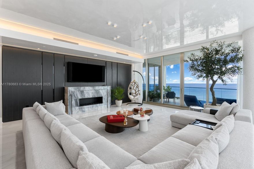 Experience luxury in this fully upgraded Amalfi unit in the Boutique North Tower of The Estates at Acqualina. This 4BD/5.5BA residence offers ocean & city views, private elevator foyer, spacious family room w/ office space, and a chef’s Molteni kitchen w/ La Cornue range, Miele & Sub-Zero appliances, pizza oven, and custom pantry. Features include smart home tech, ceiling-integrated lighting, his & hers baths, Molteni closets, Roche Bobois & Bentley furnishings, and custom window treatments. Enjoy a summer kitchen on the terrace and 45,000 SF of 5-star amenities: pools, spa, gym, skating rink, bowling & more.