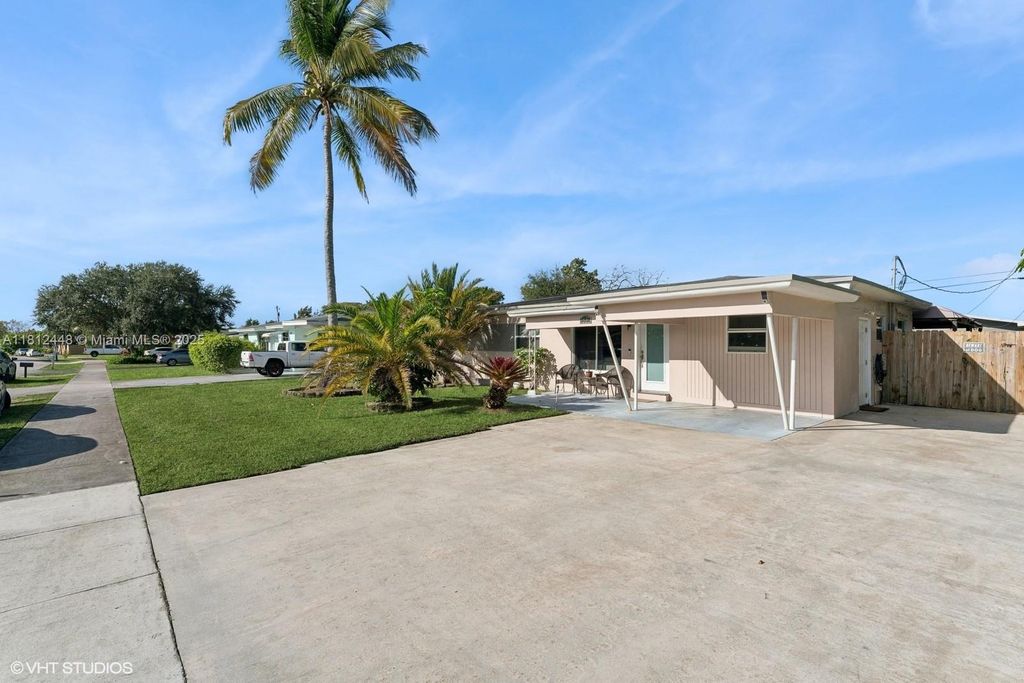 Photo of 1831 SW 42nd Ter, Fort Lauderdale, FL 33317 (MLS # A11812448)