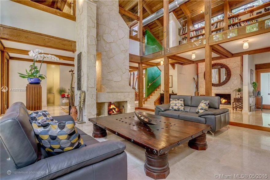 Unique contemporary California style home situated in coveted Coconut Grove. Oversized lot with a tropical botanical garden graced by a five tiered pool with cascading waterfalls. This 2 story estate with high ceilings features 5 bed & 5.5 baths, superior craftsmanship & materials including cedar, marble, venetian plaster & Murano glass throughout, 3 fire places, underground wine cellar, office, library, and a guest house. Ideally close to great schools, airport, downtown & the iconic CocoWalk.