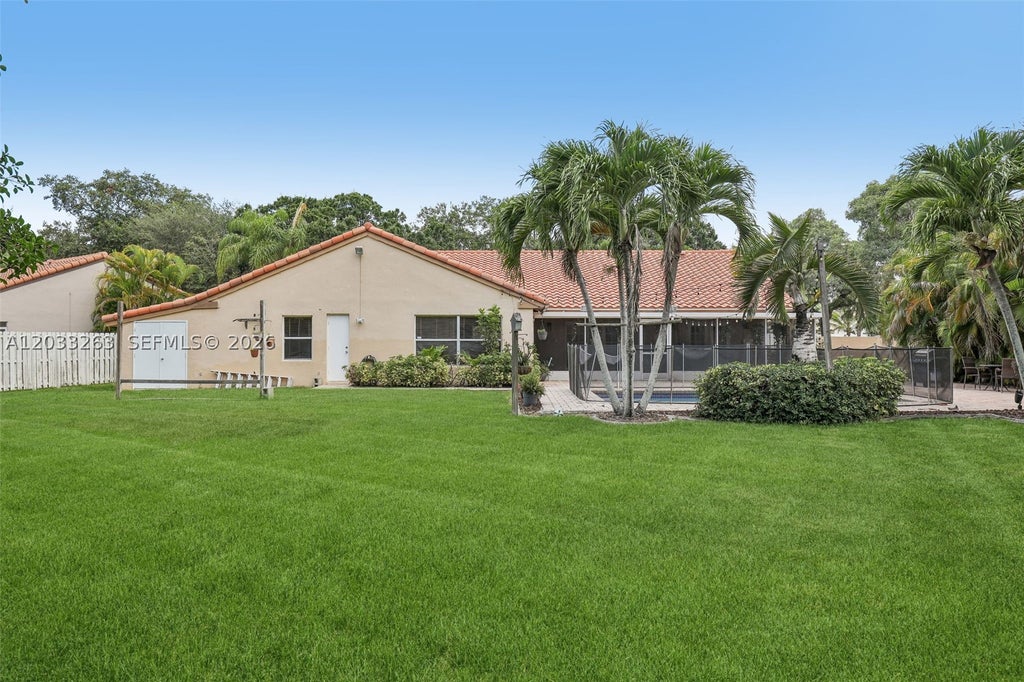 Photo of 13100 NW 11th Dr, Sunrise, FL 33323 (MLS # A12033263)