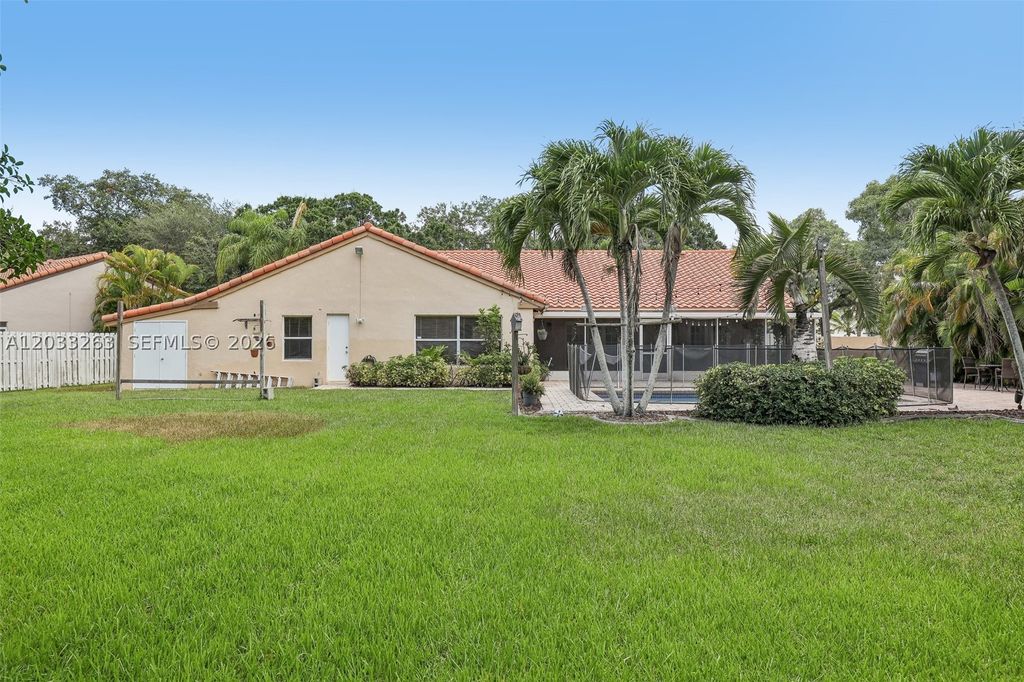 Photo of 13100 NW 11th Dr, Sunrise, FL 33323 (MLS # A12033263)