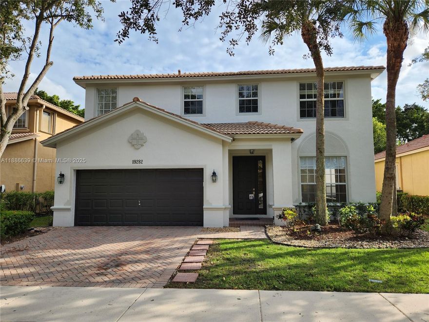 IMPECCABLE HOME, UPDATED AND UPGRADED, WITH 4 BEDROOMS, 2.5 BATHROOMS AND A LARGE GARDEN WITH NO NEIGHBORS BEHIND. NEWER LUXURY VINYL PLANKS FLOORING THROUGHOUT., KITCHEN WITH NEWER QUARTZ COUNTER TOPS AND STAINLESS STEEL APPLIANCES, LAUNDRY ROOM ON SECOND FLOOR WITH NEWER FULL SIZE WASHER & DRYER, NEW BLINDS, NEWER PLUMBING FIXTURES, NEWER LIGHT FIXTURES, INTERIOR AND EXTERIOR FRESHLY PAINTED. BASIC CABLE AND INTERNET INCLUDED (TENANT WILL PAY SET UP FEE IF ANY), LAWN MAINTENANCE INCLUDED. GREAT GATED COMMUNITY, WITH 24/7 GUARDED GATE, RESORT STYLE CLUBHOUSE WITH TWO POOLS, BASKETBALL COURT, BEACH VOLLEY COURT, NEWER EXERCISE ROOM, PLAYGROUND, AND MANY MORE AMMENITIES. CLOSE TO A RATED SCHOOLS. ENJOY WESTON LIVING AT IT'S BEST. **TENANT OCCUPIED UNTIL 11/15/2025**