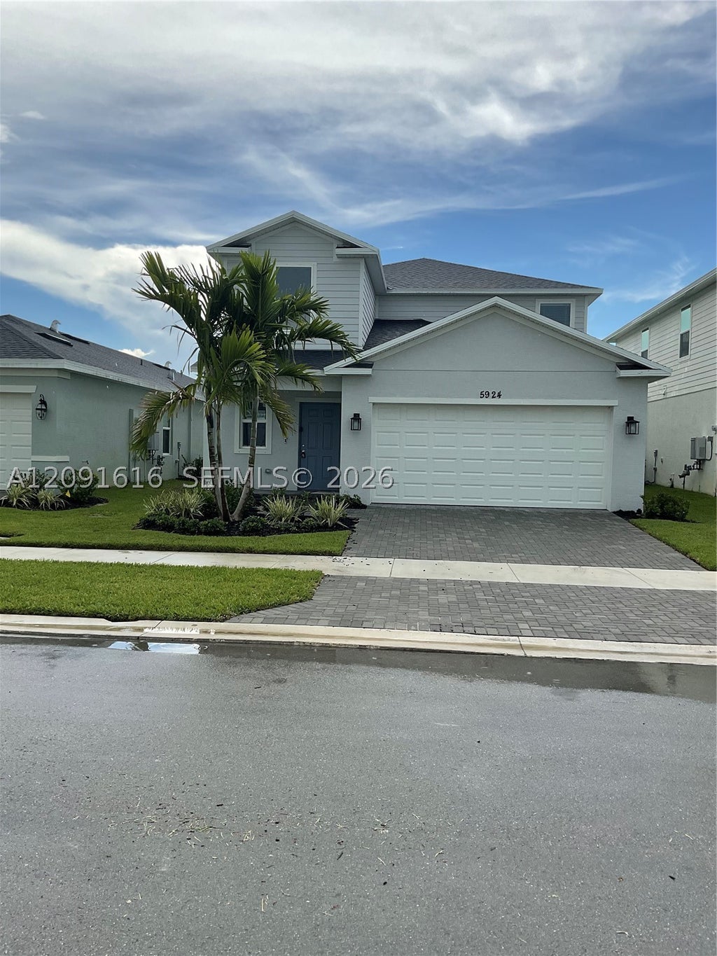 Photo of 5924 NW Fairfox Way, Port St Lucie, FL 34987 (MLS # A12091616)